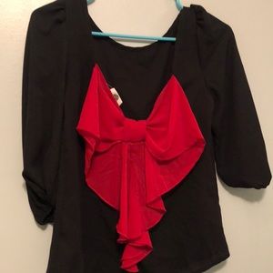 Black and red boutique now top